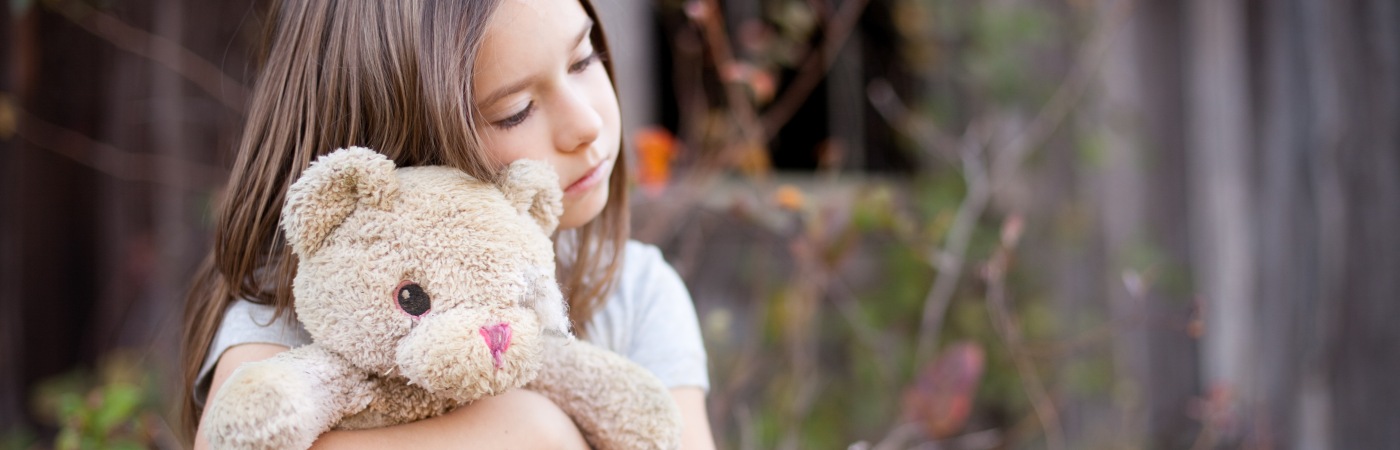 Girl with teddy bear