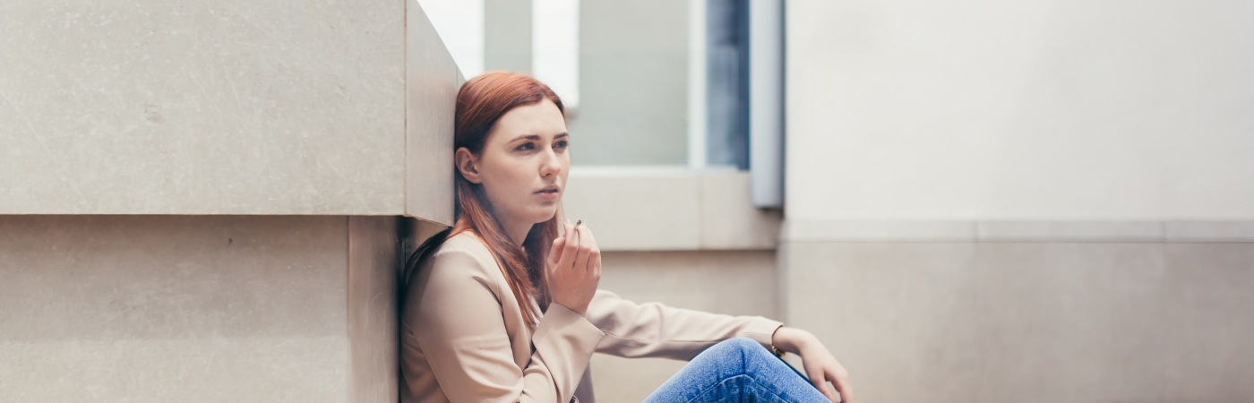 Depressed woman with cannabis