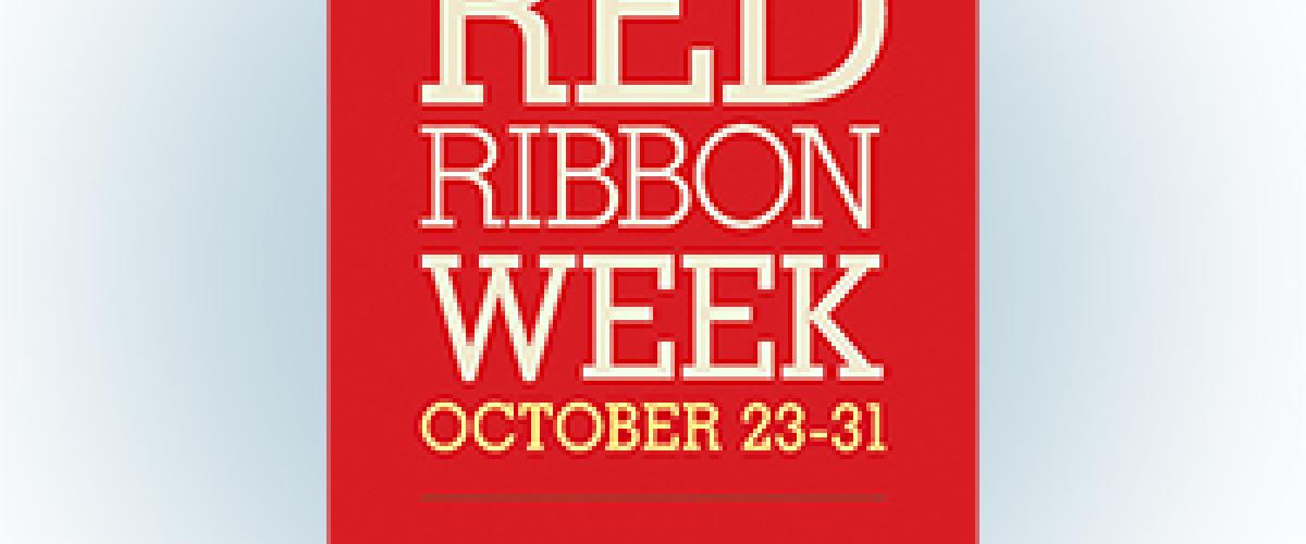 Red Ribbon with text on it reading, "Living Drug Free Red Ribbon Week October 23-31"