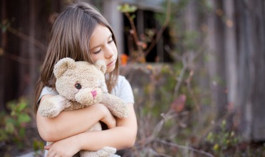 Girl with teddy bear