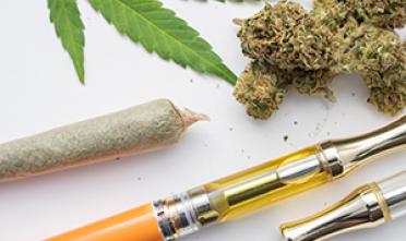 marijuana buds joint vapepen and leaf