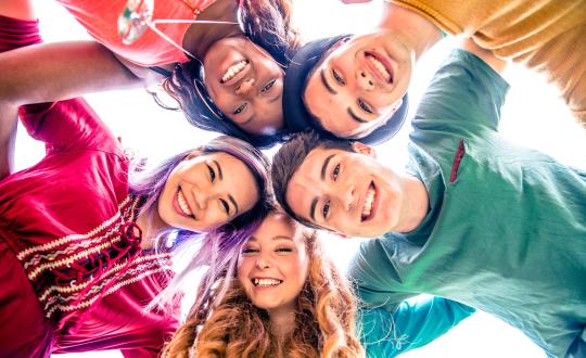 group of smiling teens