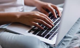 person using laptop