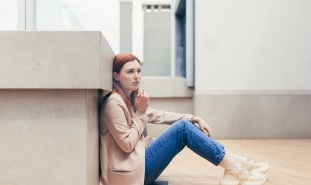 Depressed woman with cannabis