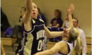 Author Abbey Zorzi playing basketball as a high school junior