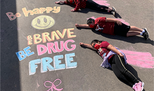 Red Ribbon Photo contest winner chalk