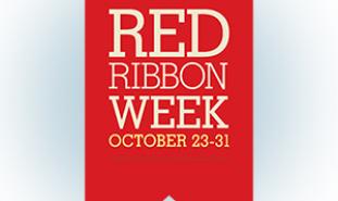 Red Ribbon with text on it reading, "Living Drug Free Red Ribbon Week October 23-31"
