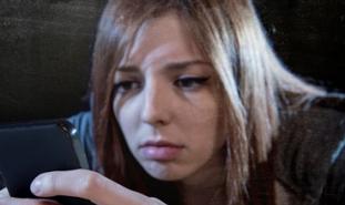 teen girl on cell phone