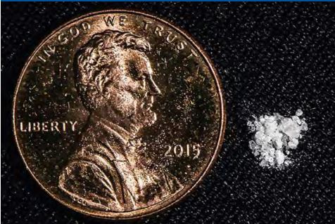 tiny amount of fentanyl next to a penny