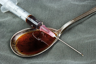 heroin in spoon