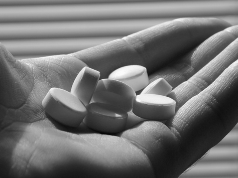 pills in hand