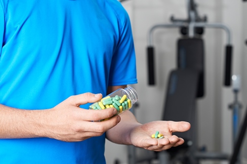 image of teens taking steroids in the gym