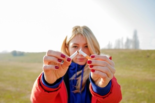 teen girl with broken cigarette