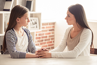 teen girl talking to mom