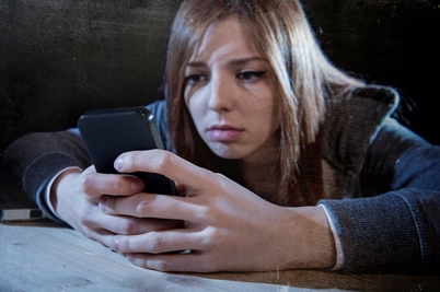 teen girl on cell phone